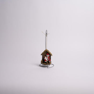 Kneeling Santa With Baby Jesus Ornament