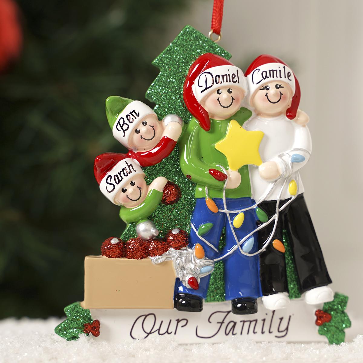 Family Of 4 Decorating Tree - Christmas Place