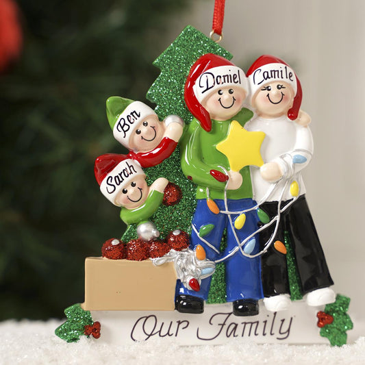 Family Of 4 Decorating Tree