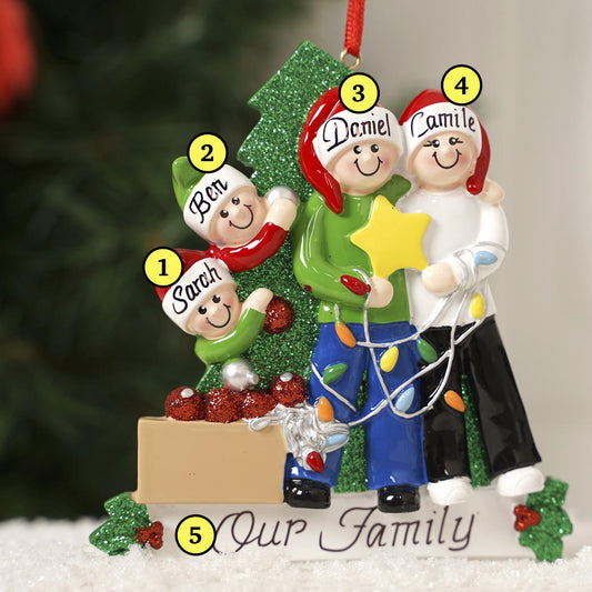 Family Of 4 Decorating Tree