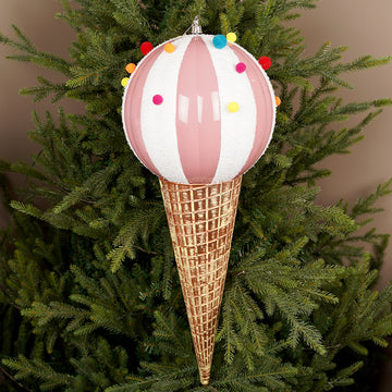 Christmas Place Ice cream cone ornament with pink top and waffle cone base on a Christmas tree.