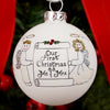 Christmas ornament with 'Our First Christmas as Mr. & Mrs.' text and angel figures.