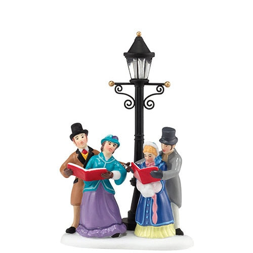 Caroling by Lamplight
