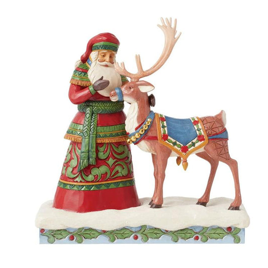 Santa Standing With Reindeer