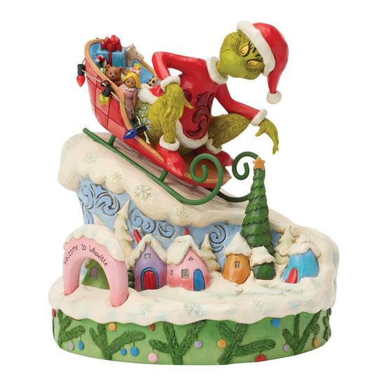 Grinch On Small Sled - Christmas Place