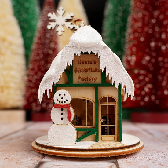 Santas Snowflake Factory Ornament - Christmas Place