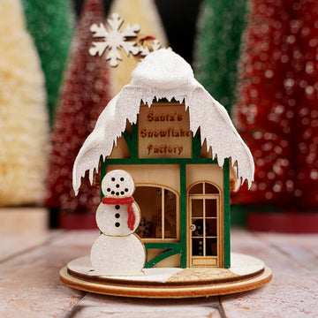 Santas Snowflake Factory Ornament - Christmas Place