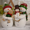 Snowman Holding Gingerbread Cookie