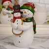 Snowman Holding Gingerbread Cookie
