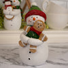 Snowman Holding Gingerbread Cookie