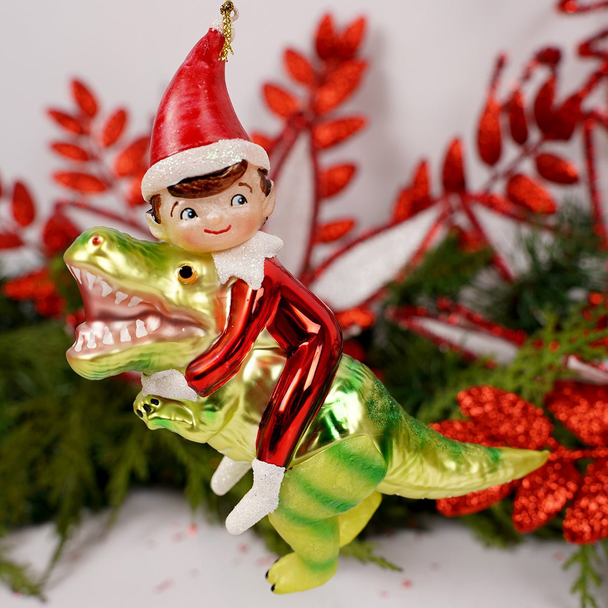 Elf Riding Dino Ornament - Christmas Place