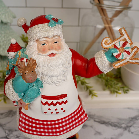 Red White Santa Holding Joy Sign - Christmas Place